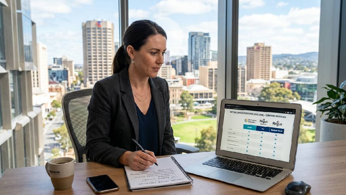 Business professional comparing virtual office provider packages on laptop with Adelaide CBD skyline showing how to choose the right provider.
