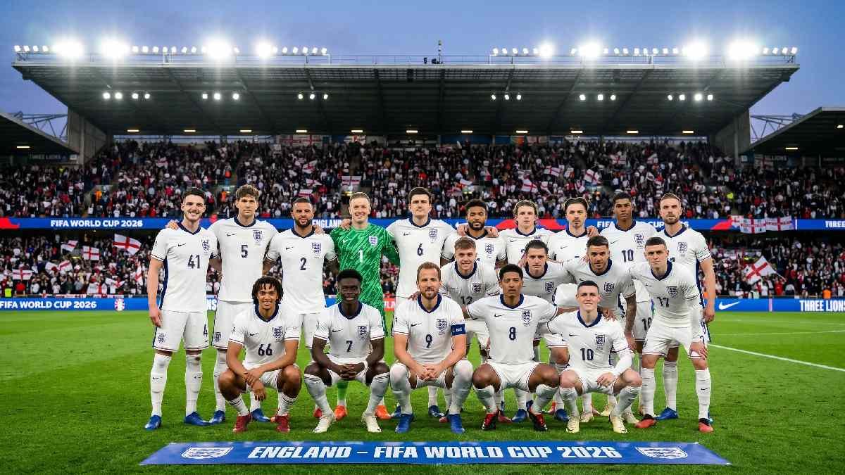 England national football squad posing together in white FIFA World Cup 2026 jerseys showing united squad strength.
