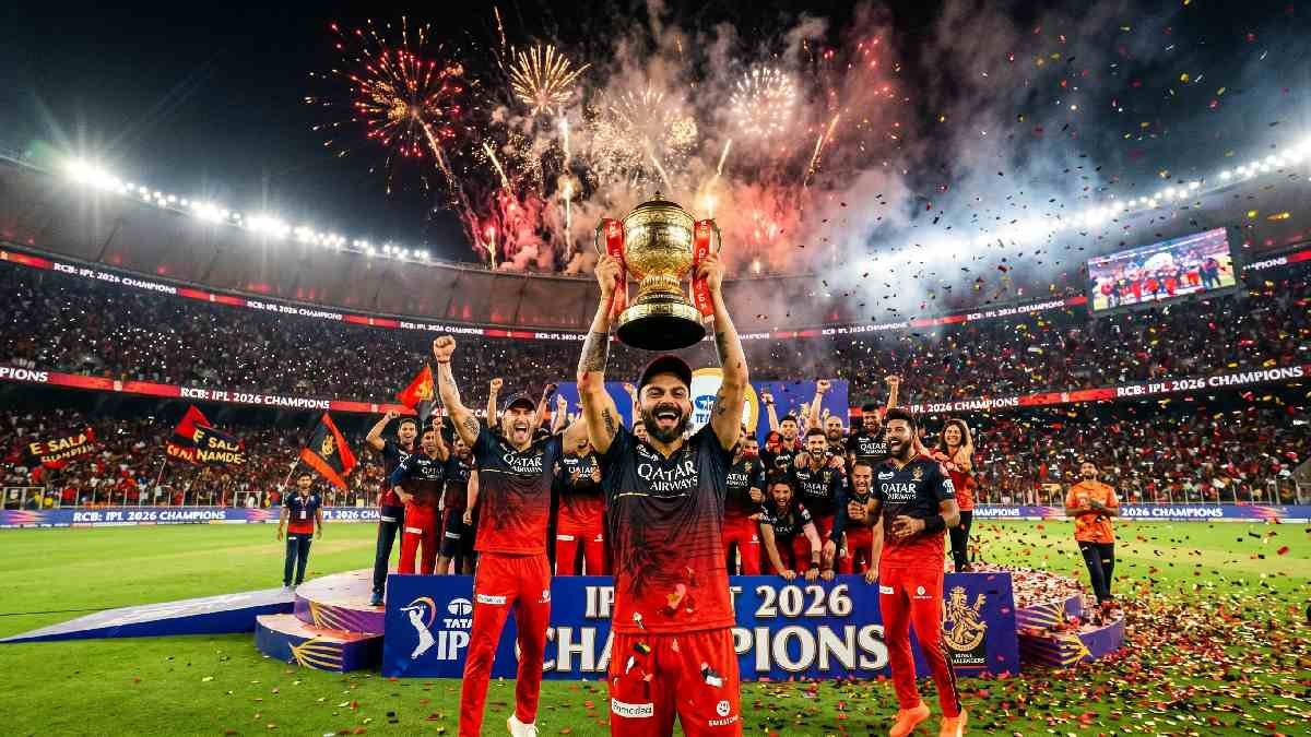 RCB players celebrating IPL 2026 championship win at Narendra Modi Stadium Ahmedabad after beating Gujarat Titans by 5 wickets.