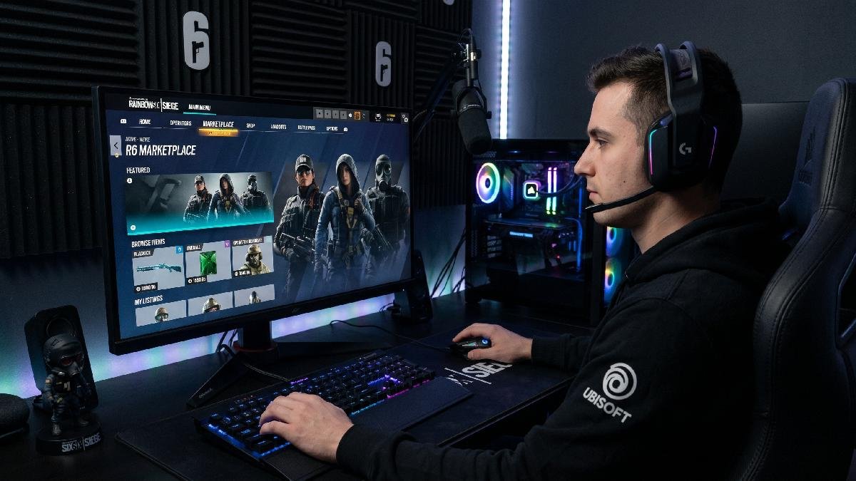 Gamer selecting R6 Marketplace tab in Rainbow Six Siege main menu on a gaming PC with RGB setup.
